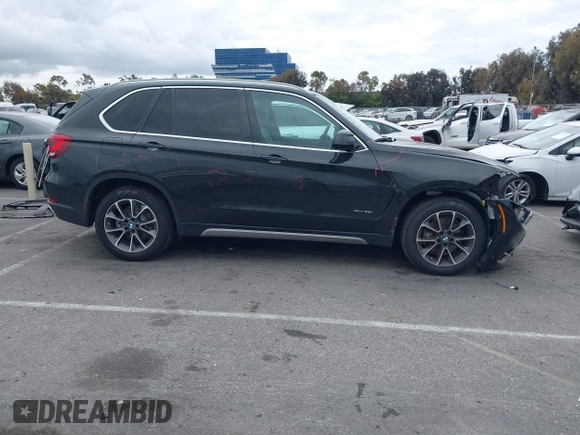 2018 BMW X5 xDrive35i with VIN 5UXKR0C55JL073210, listed as a IAAI auction lot 42047558 with 37,497 mi miles. Bid and sale history available at carsss.com. Image 14.