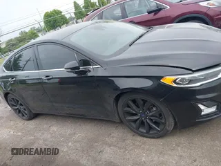 2020 Ford Fusion SEL с VIN 3FA6P0CD2LR145913, выставлен на аукционе IAAI как лот 42310012 с пробегом 121 168 миль миль и . История ставок и продаж доступна на DreamBid. Изображение 13.