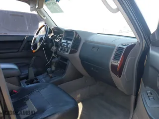 2002 Mitsubishi Montero LTD with VIN JA4MW51R72J014706, listed as a IAAI auction lot 41829993 with 201,091 mi miles. Bid and sale history available at carsss.com. Image 5.
