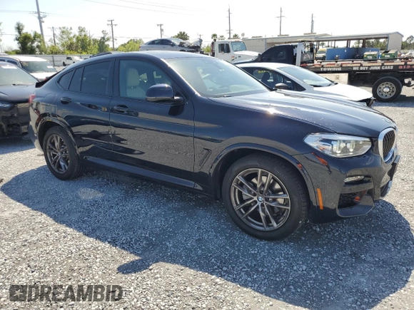 2021 BMW X4 xDrive30i z VIN 5UX2V1C09M9G11692, wystawiony jako Copart lot #51512115 z przebiegiem 16 948 mil mil oraz Szkoda całkowita • Salvage title. Historia ofert i sprzedaży dostępna na DreamBid. Obrazek 4.