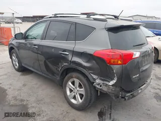 2013 Toyota RAV4 XLE with VIN 2T3WFREV3DW061989, listed as a IAAI auction lot 40766211 with 202,302 mi miles. Bid and sale history available at carsss.com. Image 3.