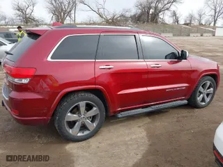 2014 Jeep Grand Cherokee Overland with VIN 1C4RJFCM0EC492833, listed as a IAAI auction lot 41836579 with 120,168 mi miles. Bid and sale history available at carsss.com. Image 13.