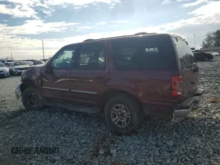 2000 Ford Expedition XLT with VIN 1FMRU166XYLA82466, listed as a Copart auction lot 42507135 with 214,014 mi miles and Salvage Title. Bid and sale history available at DreamBid. Image 2.