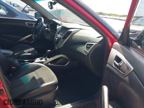 2013 Hyundai Veloster w/Black Int with VIN KMHTC6AD9DU135318, listed as a IAAI auction lot 42632212 with 97,485 mi miles and . Bid and sale history available at DreamBid. Image 5.