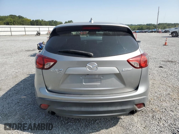 2015 Mazda CX-5 Grand Touring with VIN JM3KE4DY8F0540181, listed as a Copart auction lot 70624394 with 119,420 mi miles and Salvage Title. Bid and sale history available at carsss.com. Image 6.