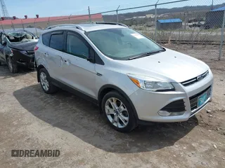 2016 Ford Escape Titanium with VIN 1FMCU9JX3GUA62802, listed as a IAAI auction lot 42001690 with 124,452 mi miles. Bid and sale history available at carsss.com. Image 1.