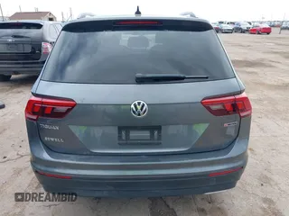2021 Volkswagen Tiguan S with VIN 3VV0B7AX0MM017433, listed as a IAAI auction lot 42017125 with 54,624 mi miles and . Bid and sale history available at DreamBid. Image 17.