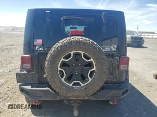 2014 Jeep Wrangler Unlimited Rubicon с VIN 1C4BJWFG7EL119344, выставлен на аукционе Copart как лот 65652265 с пробегом 150 934 миль миль и Списание • Salvage title. История ставок и продаж доступна на DreamBid. Изображение 6.