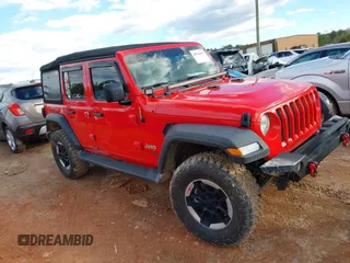 2018 Jeep Wrangler Unlimited Sport z VIN 1C4HJXDG9JW146265, wystawiony jako IAAI lot #40924465 z przebiegiem 129 234 mil mil oraz . Historia ofert i sprzedaży dostępna na DreamBid. Obrazek 1.