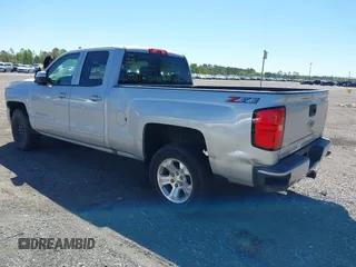 2018 Chevrolet Silverado 1500 LT with VIN 1GCVKREC9JZ335603, listed as a IAAI auction lot 41853399 with 152,460 mi miles and . Bid and sale history available at DreamBid. Image 3.