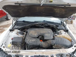 2013 Chrysler 300 with VIN 2C3CCABGXDH735739, listed as a IAAI auction lot 41282492 with 121,487 mi miles. Bid and sale history available at carsss.com. Image 10.