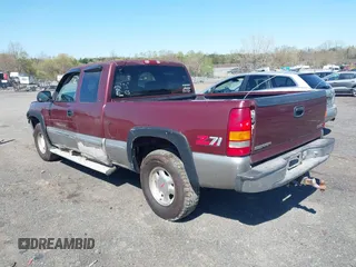 1999 GMC New Sierra 1500 SLE with VIN 2GTEK19T3X1525779, listed as a IAAI auction lot 41986559 with 254,123 mi miles. Bid and sale history available at carsss.com. Image 3.