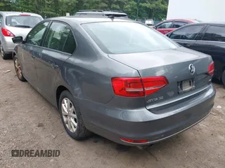 2015 Volkswagen Jetta SE z VIN 3VWD17AJ5FM285988, wystawiony jako IAAI lot #42675179 z przebiegiem 150 815 mil mil oraz . Historia ofert i sprzedaży dostępna na DreamBid. Obrazek 3.