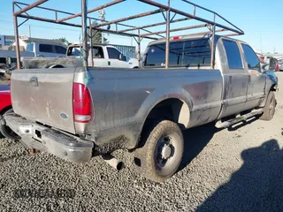 2003 Ford F-350 XL z VIN 1FTSW31P93ED31381, wystawiony jako IAAI lot #41388758 z przebiegiem 182 160 mil mil oraz . Historia ofert i sprzedaży dostępna na DreamBid. Obrazek 4.