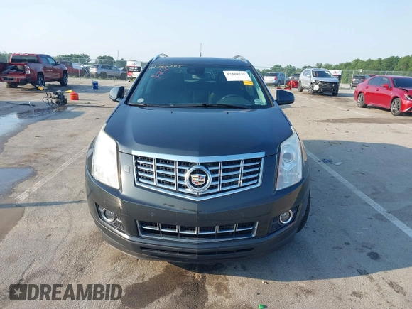 2014 Cadillac SRX Performance Collection with VIN 3GYFNFE35ES663320, listed as a IAAI auction lot 42480235 with 112,406 mi miles and . Bid and sale history available at DreamBid. Image 12.