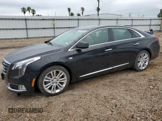 2019 Cadillac XTS Luxury z VIN 2G61M5S3XK9133339, wystawiony jako Copart lot #52651365 z przebiegiem 124 041 mil mil oraz Szkoda całkowita • Salvage title. Historia ofert i sprzedaży dostępna na DreamBid. Obrazek 1.
