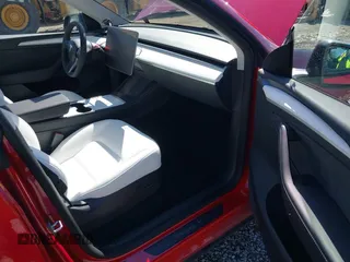 2022 Tesla Model Y Long Range with VIN 7SAYGDEE7NF549278, listed as a IAAI auction lot 42072801 with 39,374 mi miles and . Bid and sale history available at carsss.com. Image 5.