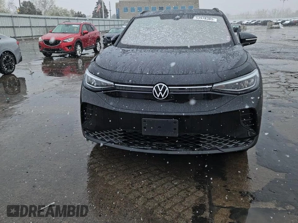 2023 Volkswagen ID.4 Pro z VIN 1V2DNPE86PC049852, wystawiony jako Copart lot #53978385 z przebiegiem 22 598 mil mil oraz Szkody całkowita. Historia ofert i sprzedaży dostępna na DreamBid. Obrazek 14.