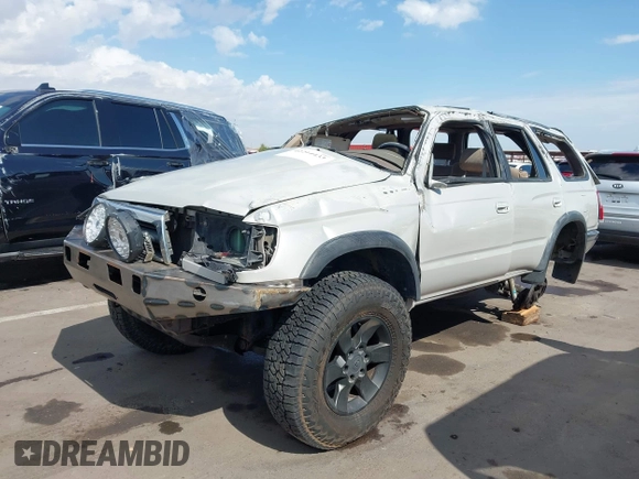 1998 Toyota 4Runner SR5 z VIN JT3HN86R2W0172312, wystawiony jako IAAI lot #42214433 z przebiegiem 259 170 mil mil oraz . Historia ofert i sprzedaży dostępna na DreamBid. Obrazek 2.