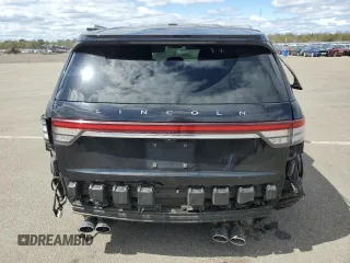 2022 Lincoln Aviator Livery z VIN 5LM5J0XC4NGL09061, wystawiony jako Copart lot #56524295 z przebiegiem 201 621 mil mil oraz Szkoda całkowita • Salvage title. Historia ofert i sprzedaży dostępna na DreamBid. Obrazek 6.