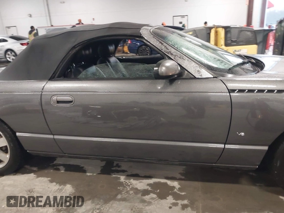 2003 Ford Thunderbird Deluxe z VIN 1FAHP60A53Y113819, wystawiony jako IAAI lot #41724732 z przebiegiem Nie podano mil oraz . Historia ofert i sprzedaży dostępna na DreamBid. Obrazek 14.