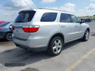 2013 Dodge Durango Citadel with VIN 1C4RDHEG0DC571833, listed as a IAAI auction lot 42736033 with 110,808 mi miles and . Bid and sale history available at DreamBid. Image 4.