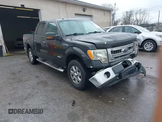2013 Ford F-150 XL with VIN 1FTFW1ETXDFD72322, listed as a IAAI auction lot 41957807 with 312,909 mi miles. Bid and sale history available at carsss.com. Image 1.