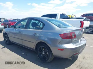 2006 Mazda Mazda3 i with VIN JM1BK12G161465537, listed as a IAAI auction lot 42074144 with 167,823 mi miles. Bid and sale history available at carsss.com. Image 3.
