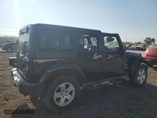 2011 Jeep Wrangler Unlimited Sahara with VIN 1J4BA5H10BL634002, listed as a Copart auction lot 75035234 with 139,182 mi miles and Salvage Title. Bid and sale history available at carsss.com. Image 3.