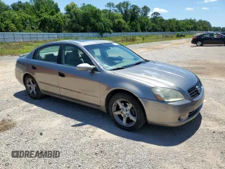 2005 Nissan Altima SE z VIN 1N4BL11D95N451242, wystawiony jako Copart lot #55942315 z przebiegiem 245 942 mil mil oraz Szkoda całkowita • Salvage title. Historia ofert i sprzedaży dostępna na DreamBid. Obrazek 4.