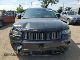2019 Jeep Grand Cherokee Altitude with VIN 1C4RJFAG5KC813144, listed as a Copart auction lot 62295595 with 140,986 mi miles and Salvage title. Bid and sale history available at DreamBid. Image 5.