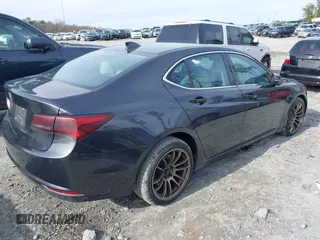 2015 Acura TLX V6 Advance with VIN 19UUB2F77FA020150, listed as a IAAI auction lot 41096144 with 127,414 mi miles. Bid and sale history available at carsss.com. Image 4.