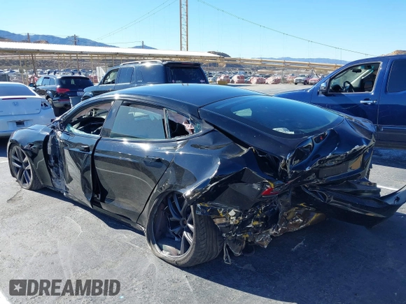2022 Tesla Model S with VIN 5YJSA1E52NF476906, listed as a IAAI auction lot 41320074 with Not Provided miles and . Bid and sale history available at DreamBid. Image 6.