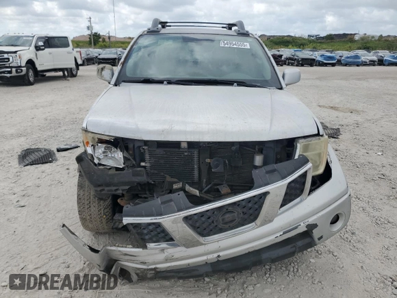 2005 Nissan Frontier LE with VIN 1N6AD07U75C452872, listed as a Copart auction lot 54954555 with 230,702 mi miles and Salvage title. Bid and sale history available at DreamBid. Image 5.