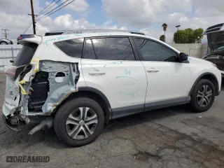 2018 Toyota RAV4 LE with VIN JTMBFREV9JD256759, listed as a Copart auction lot 51165835 with 128,253 mi miles and Salvage Title. Bid and sale history available at carsss.com. Image 3.