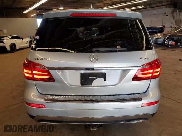2016 Mercedes-Benz GL with VIN 4JGDF6EE9GA712675, listed as a Copart auction lot 77591294 with 164,208 mi miles and Salvage Title. Bid and sale history available at carsss.com. Image 6.