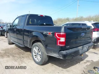 2018 Ford F-150 XL with VIN 1FTEX1EP8JFE62690, listed as a IAAI auction lot 41936883 with 162,174 mi miles. Bid and sale history available at carsss.com. Image 3.