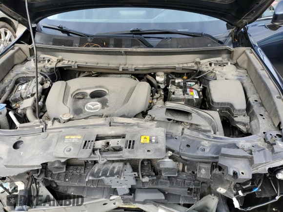 2019 Mazda CX-9 Sport с VIN JM3TCABY2K0321285, выставлен на аукционе Copart как лот 85372004 с пробегом 57 423 миль миль и Списание • Salvage title. История ставок и продаж доступна на DreamBid. Изображение 14.
