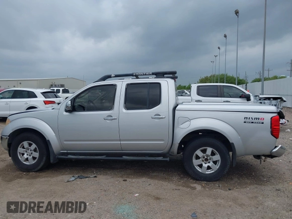 2005 Nissan Frontier LE with VIN 1N6AD07U25C457977, listed as a IAAI auction lot 41906592 with 256,116 mi miles and . Bid and sale history available at DreamBid. Image 15.