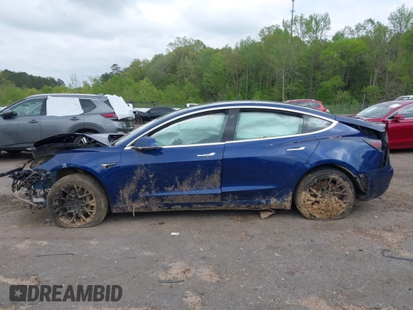 2019 Tesla Model 3 Mid Range z VIN 5YJ3E1EAXKF332974, wystawiony jako IAAI lot #41921722 z przebiegiem Nie podano mil oraz . Historia ofert i sprzedaży dostępna na DreamBid. Obrazek 14.