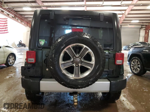 2011 Jeep Wrangler Unlimited Sahara with VIN 1J4BA5H17BL592752, listed as a Copart auction lot 83344334 with 176,259 mi miles and Clean Title. Bid and sale history available at carsss.com. Image 6.