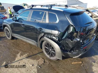 2024 Mazda CX-50 S Select with VIN 7MMVABAM9RN238672, listed as a IAAI auction lot 41854020 with 4,953 mi miles and . Bid and sale history available at DreamBid. Image 3.