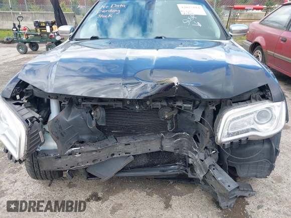 2016 Chrysler 300 with VIN 2C3CCAEG9GH282438, listed as a IAAI auction lot 42025184 with 203,159 mi miles. Bid and sale history available at carsss.com. Image 6.