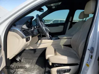 2018 BMW X6 sDrive35i with VIN 5UXKU0C5XJ0G69741, listed as a Copart auction lot 77366934 with 66,287 mi miles and Salvage Title. Bid and sale history available at carsss.com. Image 7.