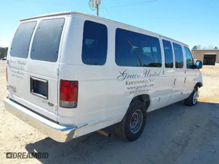 2009 Ford Econoline Wagon XL with VIN 1FBSS31L49DA13485, listed as a IAAI auction lot 41644578 with 126,803 mi miles. Bid and sale history available at carsss.com. Image 4.