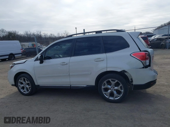 2018 Subaru Forester Touring z VIN JF2SJAWC0JH435392, wystawiony jako IAAI lot #41584762 z przebiegiem 92 151 mil mil oraz . Historia ofert i sprzedaży dostępna na DreamBid. Obrazek 14.