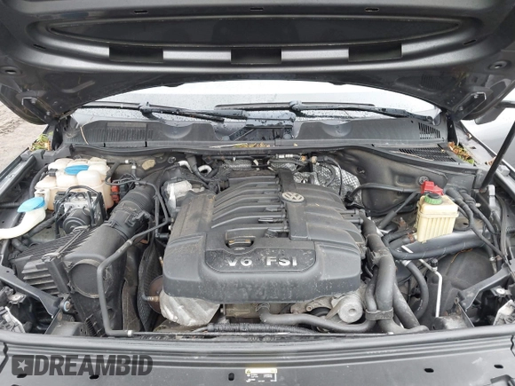 2013 Volkswagen Touareg Lux with VIN WVGEF9BP0DD005082, listed as a IAAI auction lot 41667026 with 140,148 mi miles and . Bid and sale history available at DreamBid. Image 10.