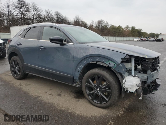 2023 Mazda CX-30 S Carbon Edition with VIN 3MVDMBCM5PM556195, listed as a Copart auction lot 47013945 with 15,223 mi miles and Salvage Title. Bid and sale history available at DreamBid. Image 4.