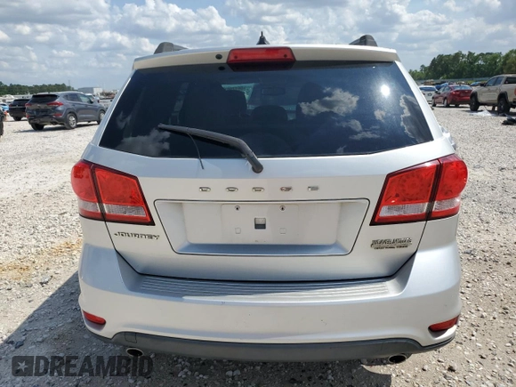 2012 Dodge Journey SXT с VIN 3C4PDCBG9CT134396, выставлен на аукционе Copart как лот 56179615 с пробегом 119 050 миль миль и Списание • Salvage title. История ставок и продаж доступна на DreamBid. Изображение 6.