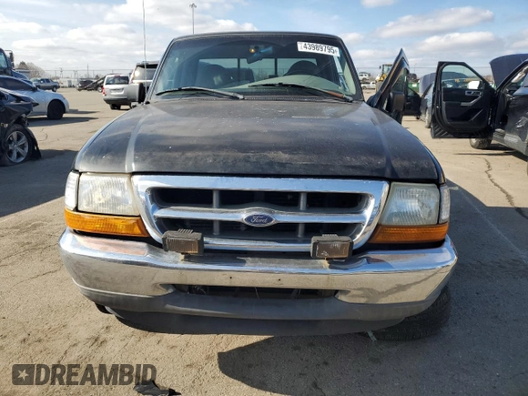 1999 Ford Ranger XL with VIN 1FTYR10V9XUB87056, listed as a Copart auction lot 43989795 with 193,980 mi miles and Salvage Title. Bid and sale history available at carsss.com. Image 5.